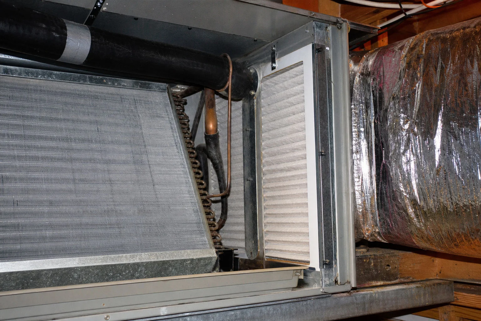 Inspection of AC coil and ductwork during diagnostic service in Fort Walton Beach